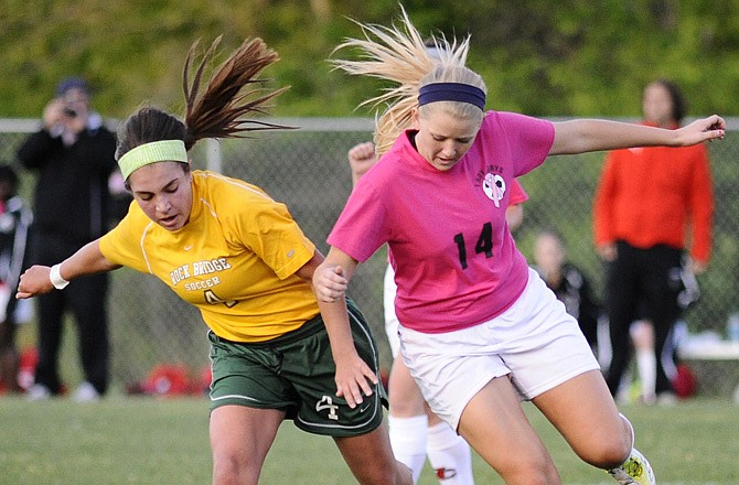 Jefferson City's Bailey Hall (right), shown battling Rock Bridge's Laurie Frew for the ball during a game last week at the 179 Soccer Park, and the rest of the Lady Jays will compete in the Capital City Invitational today and Saturday.