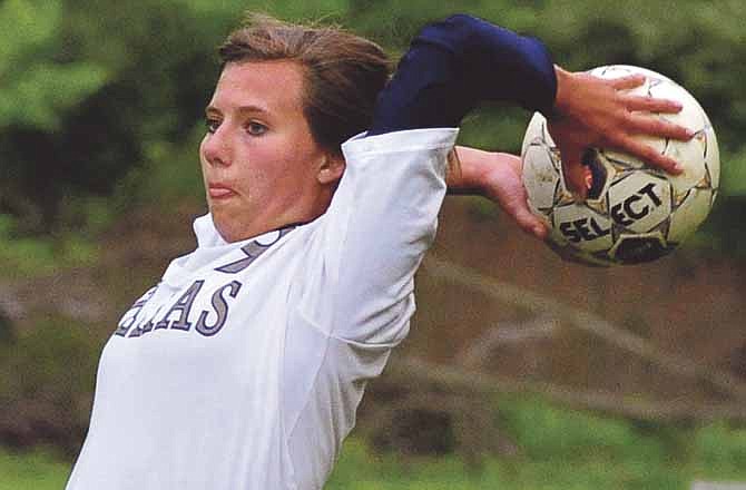 Helias Lady Crusader Haley Bax looks does a throw-in against Rosati-Kain on Friday in the first round of the Capital City Soccer Invitational at 179 Soccer Park. 