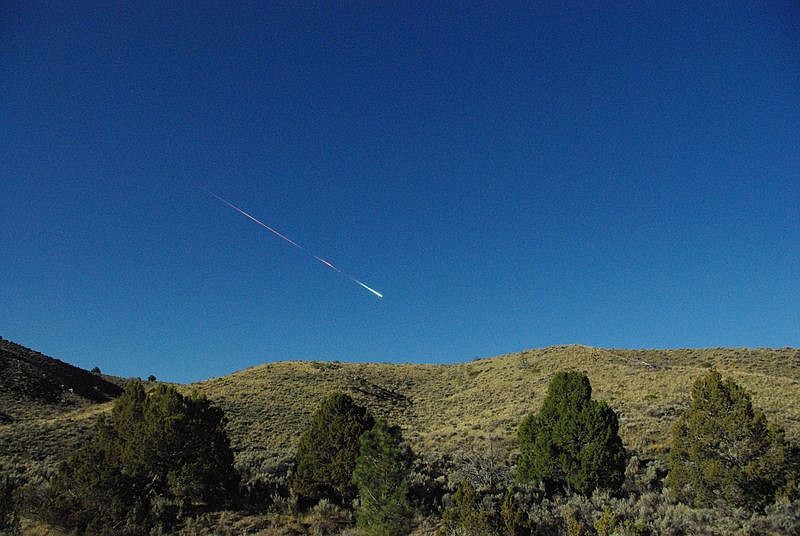 A meteor is shown over Reno Nevada on Sunday. The former space rock-turned-flaming-meteor entered Earth's atmosphere around 8 a.m. PDT. Reports of the fireball have come in from as far north as Sacramento, Calif., and as far east as North Las Vegas, Nev.