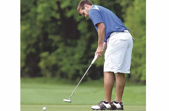 Fatima's Dusty Angerer putts during Class 2 District 4 play Wednesday at Redfield Golf Club in Eugene. 