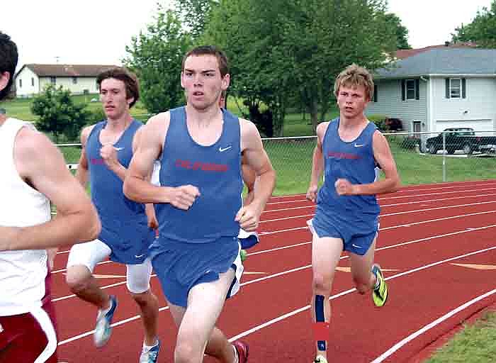 Competing in the 1600 Meter at the California Guy Rush Memorial Meet, from left, are California's Nathan Thibon, Zach Merrill and Dakota Harris.