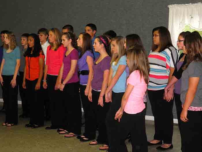 Members of the California Middle School Eighth Grade Pinto Express Vocal Group sing during the program.