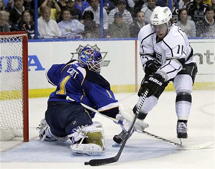 The Kings' Anze Kopitar scores past Blues goalie Brian Elliott during the first period of Monday's game in St. Louis. The Kings have a 2-0 lead in the series, with Game 3 tonight.