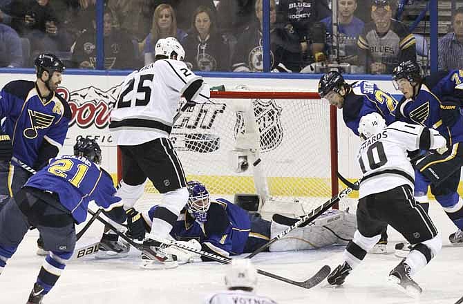 Los Angeles center Mike Richards (10) scores the first goal over Blues goaltender Brian Elliott 31 seconds into a second-round playoff game between the St. Louis Blues and the Los Angeles Kings on Monday, April 30, 2012, at the Scottrade Center in St. Louis. 