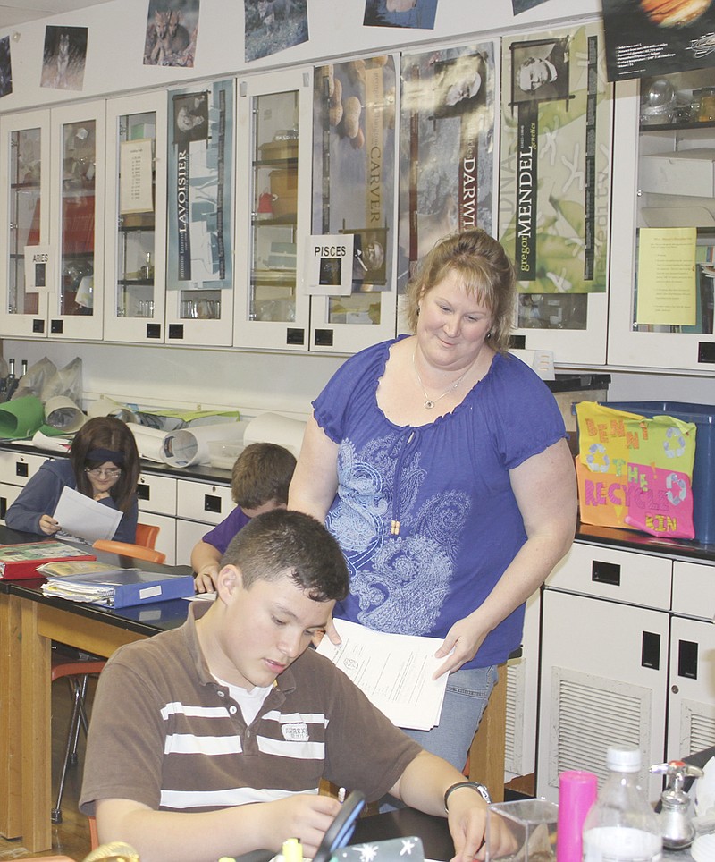 Fulton Middle School Teacher Lucy Shrout proctors a quiz in her eighth-grade science class Friday afternoon. Shrout was named Fulton Public Schools' Teacher of the Year.