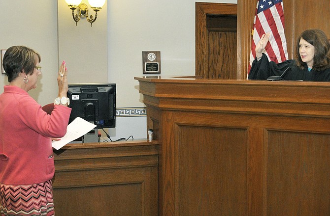 Judge Pat Joyce hosted a brief swearing-in ceremony in her courtroom to name Marilue Hemmel as the new Cole County circuit clerk.