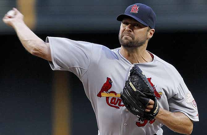 St. Louis Cardinals pitcher Jake Westbrook delivers a pitch against the Arizona Diamondbacks during the first inning of a baseball game Tuesday, May 8, 2012, in Phoenix.