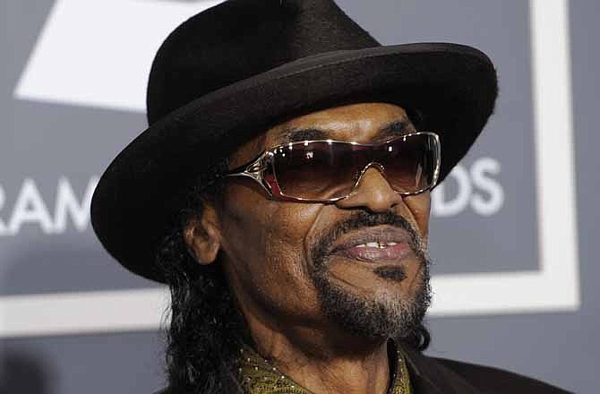 In this Feb. 13, 2011 file photo, Chuck Brown arrives at the 53rd annual Grammy Awards in Los Angeles. Brown, who styled a unique brand of funk music as a singer, guitarist and songwriter known as the "godfather of go-go," died Wednesday, May 16, 2012 after suffering from pneumonia. He was 75.