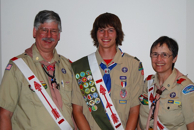 Sam Mayne smiles with his parents, Jeff and Kath, after his Eagle Scout Ceremony Tuesday. Mayne became the fifth member of his family to earn the prestigious Eagle Scout marks, and also recently earned Vigil Honors in the Order of the Arrow.