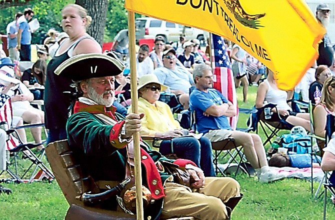 William Temple of Brunswick, Ga., a Tea Party member since 2009, portrayed Button Gwinnett, a signer of the Declaration of Independence, during the Rally for Common Sense near Holts Summit.