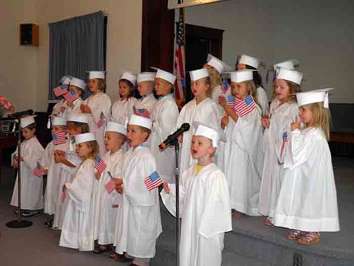 The 2011 Aurora Montessori Class sings "America" during the Graduation Ceremony.