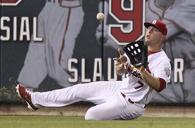 Cardinals left fielder Matt Holliday catches a line drive off the bat of Philadelphia's Shane Victorino to end the top of the ninth inning during a game between the St. Louis Cardinals and the Philadelphia Phillies on Thursday, May 24, 2012, at Busch Stadium in St. Louis.