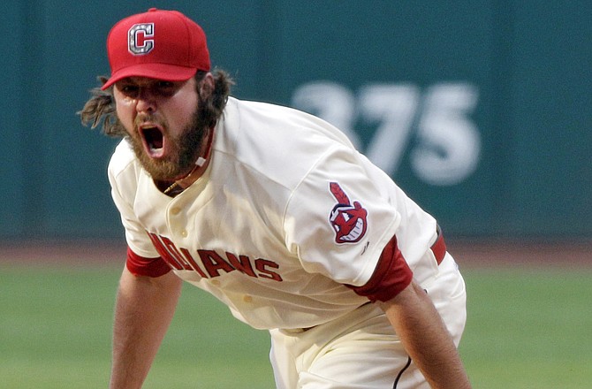 Indians reliever Chris Perez reacts after getting the final out of Monday's win over the Royals in Cleveland.