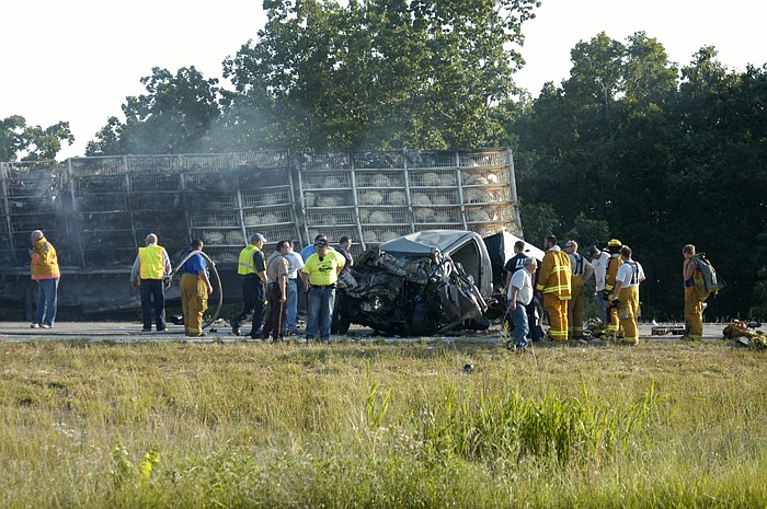 The driver of the pickup in the foreground died after crossing the center line and striking the poultry transport truck head-on on Highway 50 on the hill just west of Stockhaven Road. The highway was closed for several hours while the site was cleaned up and th accident investigated. The driver of the semi sustained minor injuries.