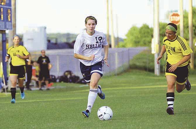 Becky Roberts of Helias (above center) is among area first-team selections to all-district soccer teams named by coaches. 