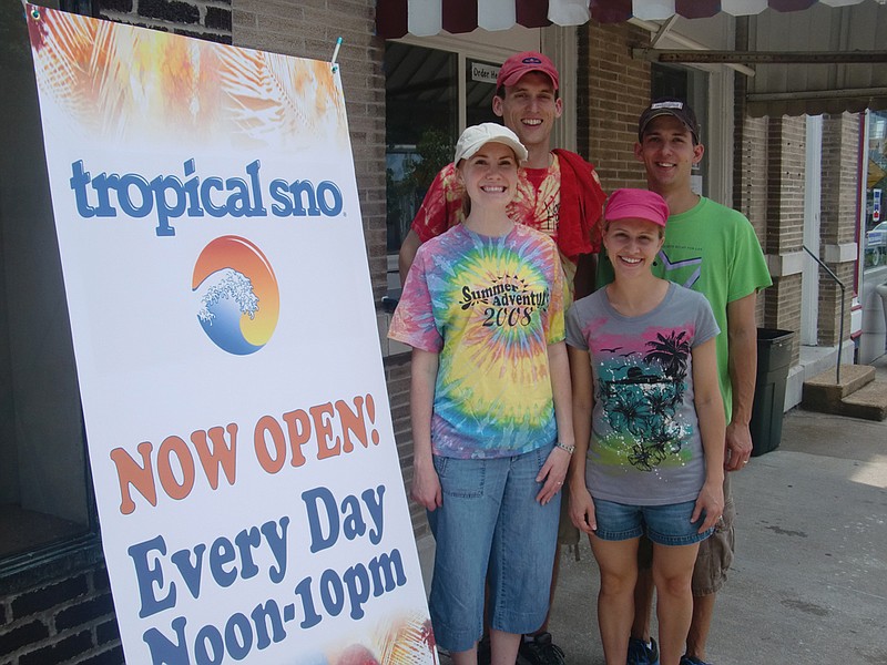 Co-owners of downtown Fulton's Tropical Sno, clockwise from bottom left: Lillian Hoell, Stephen Hoell, Zach Poss and Sandee Poss. Tropical Sno will have its official grand opening on 3:30 p.m. Monday, at its Court Street location.