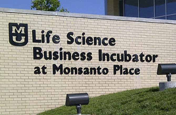This June 4, 2012, photo shows the Life Science business Incubator on the University of Missouri Campus in Columbia. Monsanto plays a prominent role on the Missouri campus, where science students attend lectures in Monsanto Auditorium and professors spin their university research off into private companies at the Monsanto Place "life sciences business incubator," which was built with the help of a $2 million corporate grant. 