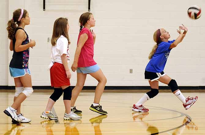 Players go through a setting drill during the Jefferson City Lady Jays volleyball camp this week at Fleming Fieldhouse.