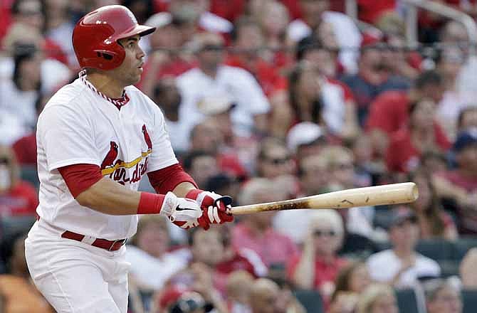St. Louis Cardinals' Carlos Beltran watches his solo home run in the third inning of a baseball game against the Cleveland Indians, Saturday, June 9, 2012, in St. Louis. 