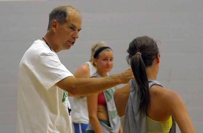 Blair Oaks coach Leroy Bernskoetter gives instruction during the Lady Falcons' camp Monday at Blair Oaks Middle School.
