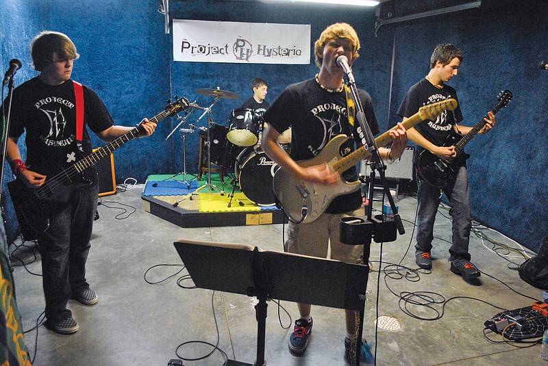 Project Hysteria practices some of their favorite tunes including Green Day's "Brain Stew" and "Wild Thing" at a recent rehearsal.