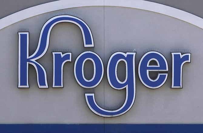 This June 12, 2012, photo shows the Kroger sign over the company's grocery store in Dearborn, Mich. Kroger also operates Dillons, Gerbes, Ralphs, Food 4 Less and Fred Meyer stores.