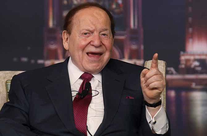 In this April 12, 2012 file photo, Las Vegas Sands Chairman and CEO Sheldon Adelson speaks at a news conference for the Sands Cotai Central in Macau. Sen. John McCain, R-Ariz., said in an interview posted online Friday that "foreign money" was helping fellow Republican Mitt Romney's presidential hopes and singled out one of his ally's most generous supporters. 