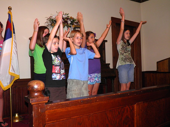 Youth ages 3 through sixth grade who attended the High Point Baptist Church Vacation Bible School last week (June 10-15) gathered for a group picture during the opening ceremony Thursday night.