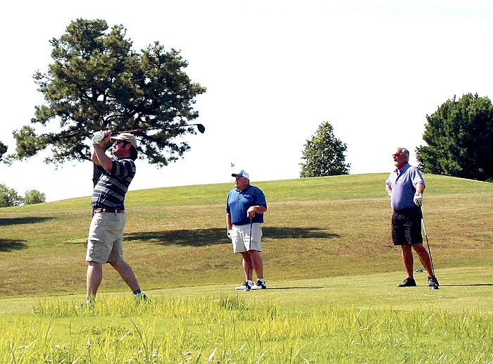 The team of three that finished the California Area Chamber of Commerce Golf Tournament in second place, from left, are Mike Moon, Dwight Sanders and Donald Moon.