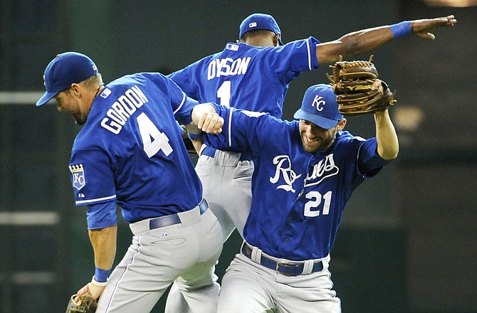 Alex Gordon, Jarrod Dyson and Jeff Francoeur (21) celebrate the Royals' 2-1 victory against the Astros on Wednesday in Houston.