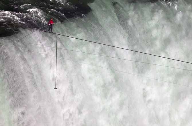 Nik Wallenda walks over Niagara Falls on a tightrope in Niagara Falls, Ontario, on Friday, June 15, 2012.