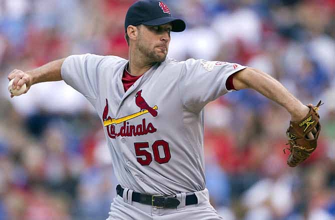 St. Louis Cardinals starter Adam Wainwright pitches to Kansas City Royals' Alex Gordon during the first inning of a baseball game at Kauffman Stadium in Kansas City, Mo., Saturday, June 23, 2012.