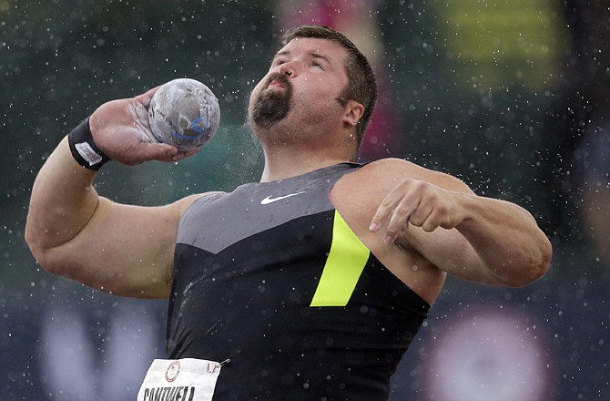 Christian Cantwell throws during the men's shot put competition at the U.S. Olympic Track and Field Trials on Saturday in Eugene, Ore.