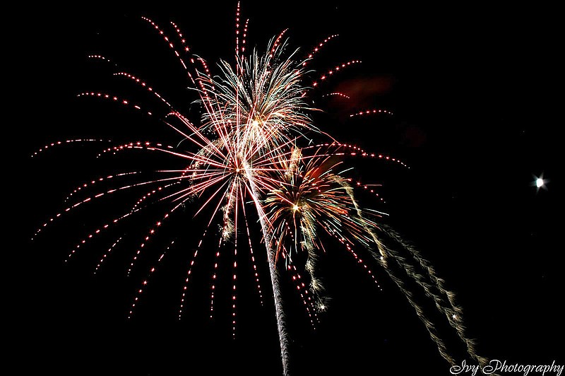 Fireworks explode over downtown Fulton during the 2010 Fulton Street Fair. After this year's fireworks show was cancelled due to weather, the Fulton Street Fair Committee decided to donate its unused fireworks to the Fulton Country Club for its annual 4th of July display.