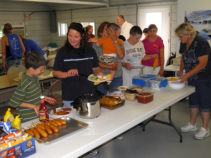 Plenty of goodies, including chili and corn dogs, were available during the dinner held each night as shown here before the final night of Lupus Baptist Church's VBS held Friday, June 22.