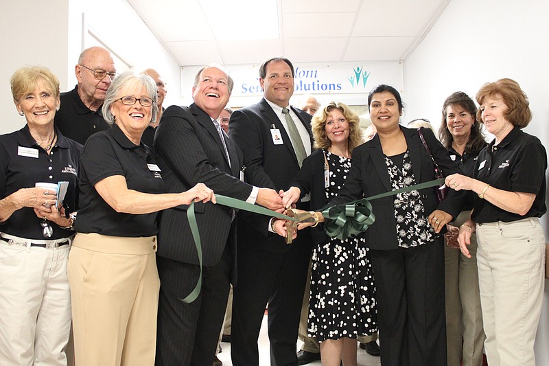 Callaway Community Hospital staff and Chamber of Commerce Kingdom Ambassadors ceremonially cut the ribbon at the entry of the new Kingdom Senior Solutions. The new geriatric psychiatry ward will provide inpatient services to senior citizens with mental health issues.