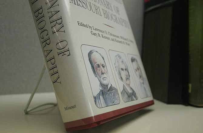 The "Dictionary of Missouri Biography" stands on display at the University of Missouri Press on Friday, June 1, 2012, in Columbia, Mo. The dictionary is one of many books that have been published by the University of Missouri Press whose focus has been to preserve the cultural history of Missouri. The original illustrations for the book remain on display at the offices. The planned closing of the University of Missouri Press comes as academic publishers struggle with the shift to digital-first information.