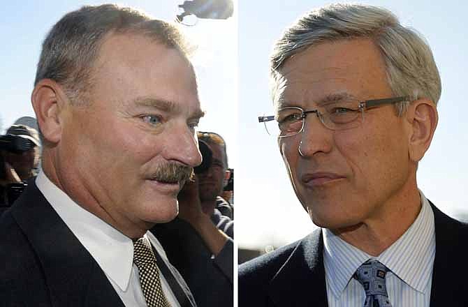 In these Nov. 7, 2011 file photos, former Penn State vice president Gary Schultz, left, and former athletic director Tim Curley, right, enter a district judge's office for an arraignment in Harrisburg, Pa., for their actions related to the sex abuse scandal surrounding former Penn State assistant football coach Jerry Sandusky.