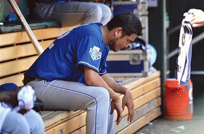 Royals starting pitcher Bruce Chen sits in the dugout during Kansas City's 10-8 loss to the Twins on Sunday in Minneapolis, Minn. 
