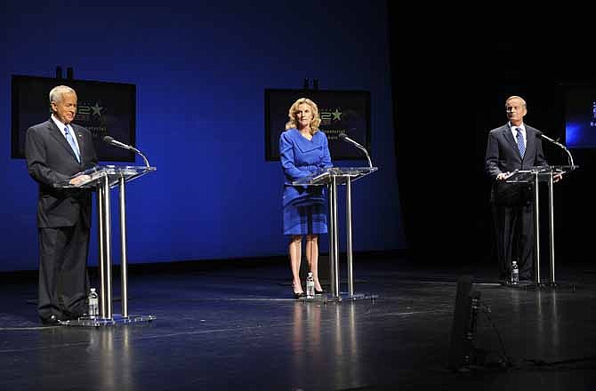 Republican candidates for the U.S. Senate, John Brunner, left, Sarah Steelman, center, and Todd Akin are introduced at the start of a debate at Washington University in St. Louis, Friday, July 6, 2012. The candidates are competing to challenge Sen. Claire McCaskill, D-Mo., in the fall election.