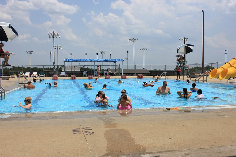 Swimmers try to beat the heat at Oestreich Memorial Pool Friday afternoon. The relentless heat wave in Fulton over the past 11 days has seen families coming to the pool in droves; in their first two hours of business, over 70 swimmers had visited the pool Saturday.