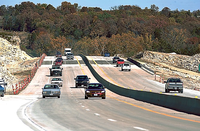 Area drivers travel along Missouri 179 over work on the new Mission Drive interchange.