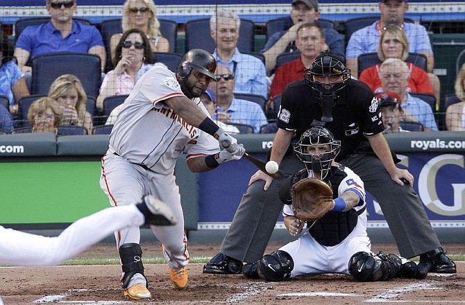 Pablo Sandoval of the Giants rips a three-run triple off of the Tigers' Justin Verlander during the first inning of Tuesday night's All-Star game in Kansas City.