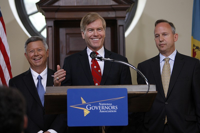 Nebraska Gov. Dave Heineman, left, Virginia Gov. Bob McDonnell, center, both Republicans, and Delaware Gov. Jack Markell, right, a Democrat, had different reactions when a reporter asked Friday if President Barack Obama had been invited to the National Governors Association meeting in Williamsburg, Va. Obama had campaign events scheduled in Hampton and Virginia Beach, on Friday.