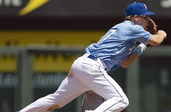 Royals second baseman Chris Getz forces out the White Sox' A.J. Pierzynski during Sunday's game at Kauffman Stadium. The Royals lost 2-1.