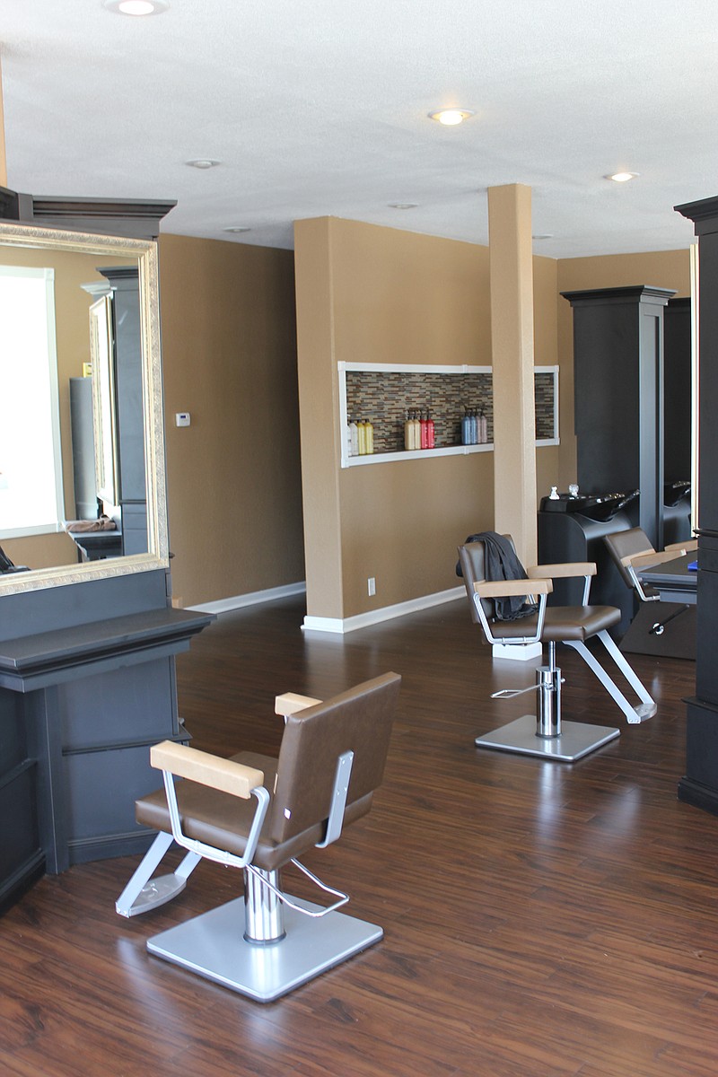 Hot Iron Salon's new Market Street location sports a more modern design and allows more room for tanning, massage therapy and other services.