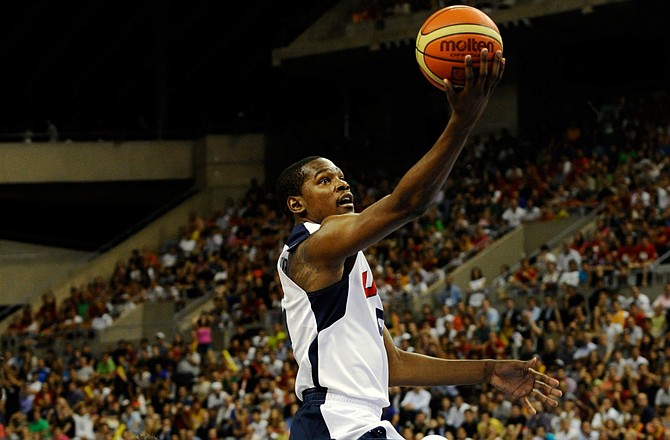 Kevin Durant of the U.S. goes up for a layup during Tuesday's exhibition game against Spain in Barcelona, Spain.