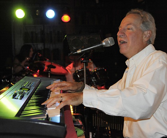 
Musician Mike Michelson performs Friday at The Library Lounge Piano Bar at Truman Hotel. After 39 years playing at The Library, tonight will be Michelson's last show.