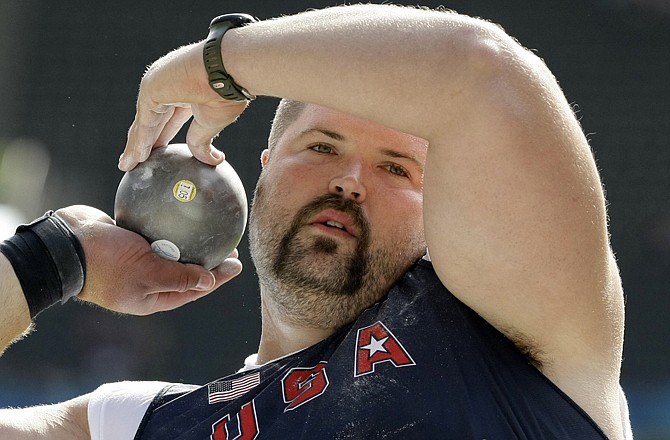 Christian Cantwell competes in the shot put during the World Athletics Championships in 2009 in Berlin, Germany. Cantwell, an Eldon native, will compete Friday in the shot at the Olympics in London. 