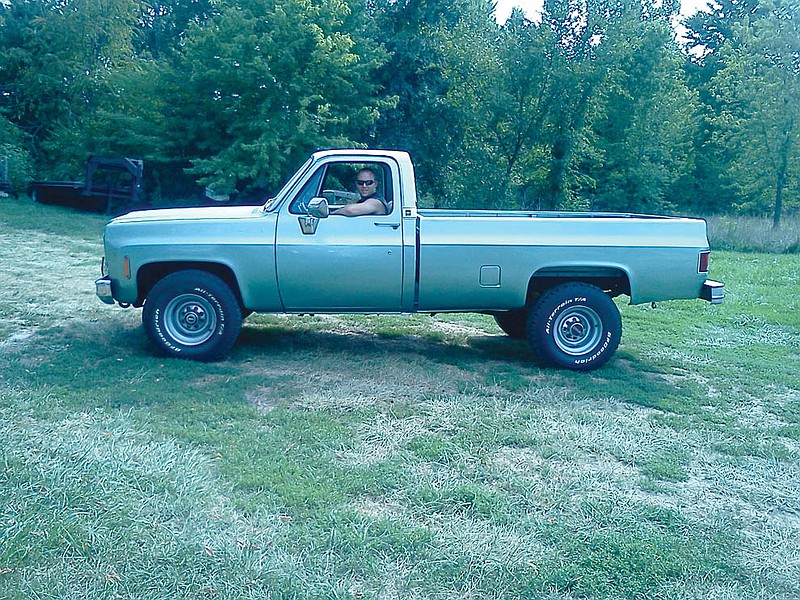 "Grandpa's pullin' truck," a '78 GMC, was originally used in the county fair's truck pull by "Gene" Lepley in the years before his death in 2003. Driven here by his grandson, Leslie Arms, Lepley's family fixed up the truck and still enter it every year in his memory.